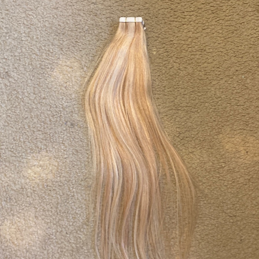 Frosted blonde tape in hair extentions
